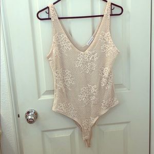 Light pink body suit!